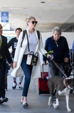 KATE UPTON with Her Dog at LAX Airport in Los Angeles 05/16/2017