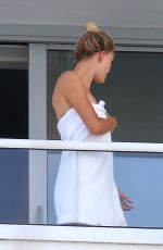 KELLY ROHRBACH on the Balcony of Her Hotel Room in Miami 05/12/2017