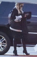 KHLOE KARDASHIAN Boarding a Private Plane in Los Angeles 05/14/2017