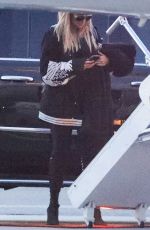 KHLOE KARDASHIAN Boarding a Private Plane in Los Angeles 05/14/2017