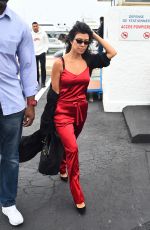 KOURTNEY KARDASHIAN Boarding a Plane in Cannes 05/26/2017