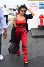 KOURTNEY KARDASHIAN Boarding a Plane in Cannes 05/26/2017