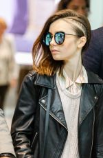 LILY COLLINS Arrives at Heathrow Airport in London 05/23/2017