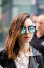 LILY COLLINS Arrives at Heathrow Airport in London 05/23/2017