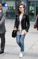 LILY COLLINS Arrives at Heathrow Airport in London 05/23/2017