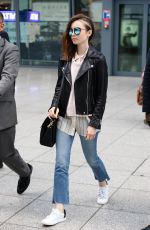 LILY COLLINS Arrives at Heathrow Airport in London 05/23/2017