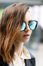 LILY COLLINS Arrives at Heathrow Airport in London 05/23/2017