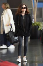 LILY COLLINS Arrives at JFK Airport in New York 04/30/2017