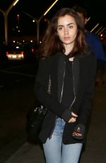 LILY COLLINS at LAX Airport in Los Angeles 05/04/2017