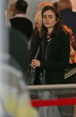 LILY COLLINS in Jeans at JFK Airport in New York 05/03/2017