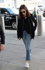 LILY COLLINS in Jeans at JFK Airport in New York 05/03/2017