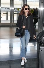 LILY COLLINS in Jeans at JFK Airport in New York 05/03/2017