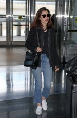 LILY COLLINS in Jeans at JFK Airport in New York 05/03/2017