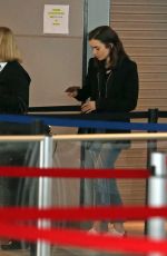 LILY COLLINS in Jeans at JFK Airport in New York 05/03/2017