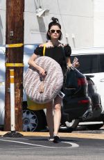 LUCY HALE Picks Up Large Bed for Her Dog in Los Angeles 05/04/2017