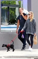 MARGOT ROBBIE Walks Her Dog Out in Los Angeles 05/18/2017\
