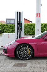 MICHELLE HUNZIKER Drives Her Porsche Out in Biella 05/06/2017