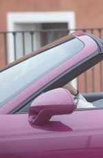 MICHELLE HUNZIKER Drives Her Porsche Out in Biella 05/06/2017