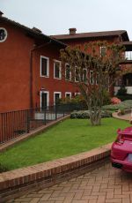 MICHELLE HUNZIKER Drives Her Porsche Out in Biella 05/06/2017
