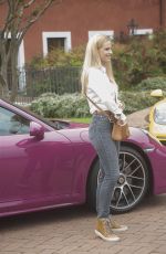 MICHELLE HUNZIKER Drives Her Porsche Out in Biella 05/06/2017
