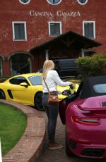 MICHELLE HUNZIKER Drives Her Porsche Out in Biella 05/06/2017