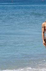 MICHELLE HUNZIKER in Bikini on the Beach in Varigotti 05/21/2017