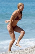 MICHELLE HUNZIKER in Bikini on the Beach in Varigotti 05/21/2017