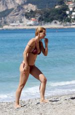 MICHELLE HUNZIKER in Bikini on the Beach in Varigotti 05/21/2017