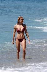MICHELLE HUNZIKER in Bikini on the Beach in Varigotti 05/21/2017