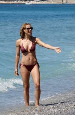 MICHELLE HUNZIKER in Bikini on the Beach in Varigotti 05/21/2017