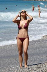 MICHELLE HUNZIKER in Bikini on the Beach in Varigotti 05/21/2017