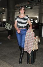 MILLA JOVOVICH at Los Angeles International Airport 05/10/2017