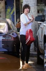 MILLA JOVOVICH Out on Larchmont Blvd in Los Angeles 05/04/2017