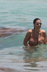 NATASHA OAKLEY and DEVIN BRUGMAN in Bikinis at a Beach in Miami 05/04/2017