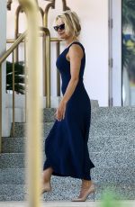 PAMELA ANDERSON Leaves Her Hotel in Miami 05/14/2017