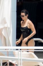 PENELOPE CRUZ in Black Swimsuit at a Pool in Miami 05/19/2017