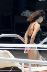 PENELOPE CRUZ in Black Swimsuit at a Pool in Miami 05/19/2017