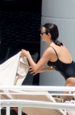 PENELOPE CRUZ in Black Swimsuit at a Pool in Miami 05/19/2017