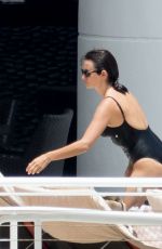 PENELOPE CRUZ in Black Swimsuit at a Pool in Miami 05/19/2017