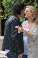 Pregnant ABI TITMUSS and Ari Welkom Share a Kiss Out in Los Angeles 05/28/2017