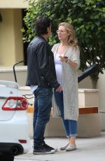 Pregnant ABI TITMUSS and Ari Welkom Share a Kiss Out in Los Angeles 05/28/2017