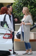 Pregnant ABI TITMUSS and Ari Welkom Share a Kiss Out in Los Angeles 05/28/2017