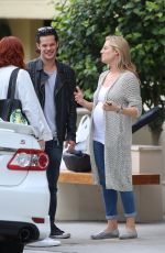 Pregnant ABI TITMUSS and Ari Welkom Share a Kiss Out in Los Angeles 05/28/2017
