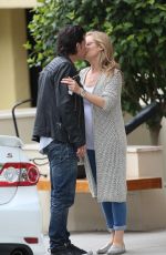 Pregnant ABI TITMUSS and Ari Welkom Share a Kiss Out in Los Angeles 05/28/2017