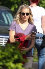 SIENNA MILLER Arrives at the Set of The Burning Woman in Canton 05/16/2017