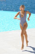 TALLIA STORM in Swimsuit at Eden Roc Hotel Pool in Cannes 05/19/2017