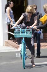 ANNE HECHE Out on a Bike in West Hollywood 06/12/2017
