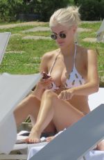 ASHLEY JAMES in Bikini at a Pool in Marbella 06/06/2017