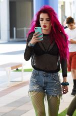 BELLA THORNE Shows Neon Pink Hairdo Out in Hollywood 06/14/2017