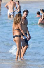 BROOKE BURKE in Bikini at a Beach in St Tropez 06/17/2017